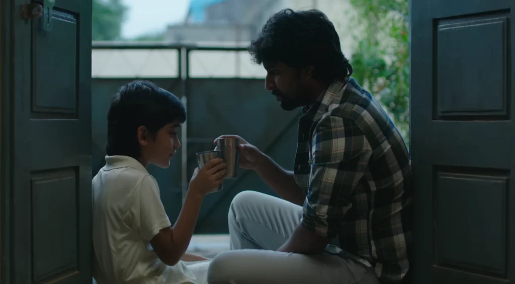 Nani and Ronit Kamra sitting on steps in Jersey.