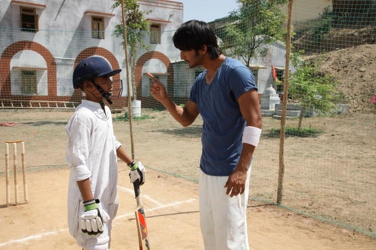 Sushant Singh Rajput as Ishaan strictly coaching the kid Ali in Kai Po Che.