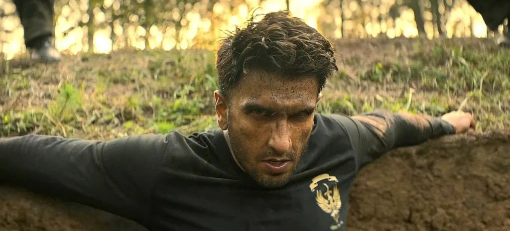 Jaskirat staring at the camera in the final shot of the movie, which features the Top 3 Songs from Dhurandhar.