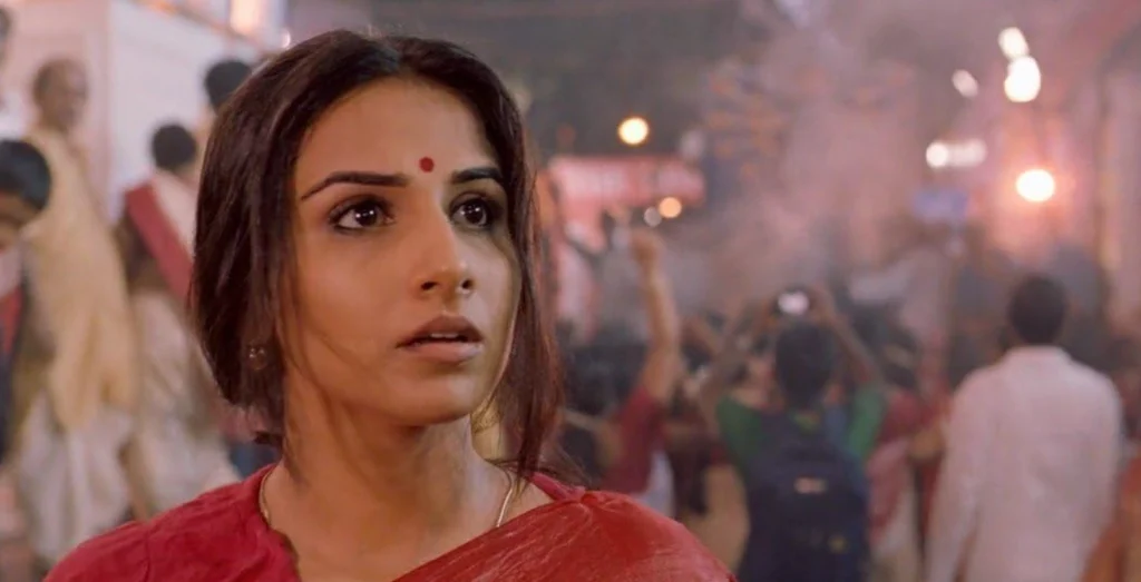 Vidya Balan in a red and white saree during the Kahaani movie climax.