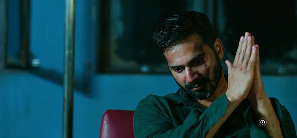 Varun Dhawan as Raghu in Badlapur Varun Dhawan standing with folded hands in a very serious scene in Badlapur movie review.