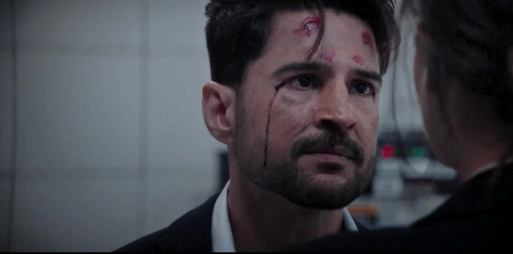A bleeding Rajeev Khandelwal looking at Diana Penty in a tense scene from my Bloody Daddy movie review.