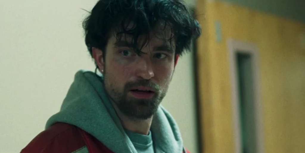 Robert Pattinson Good Time Robert Pattinson looking intense in a scene from the crime thriller movie Good Time.