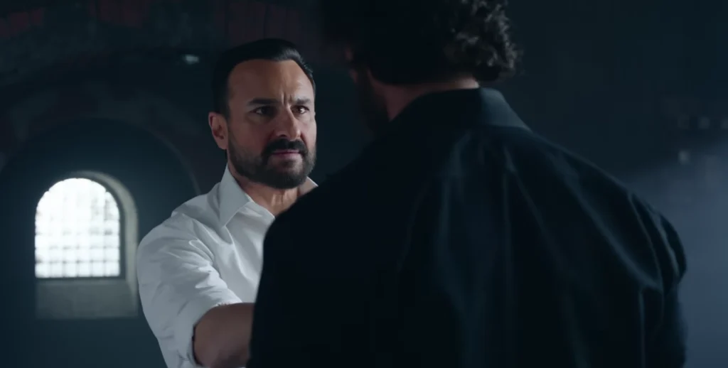 Vikram Vedha Saif Pushing Hrithik Vikram angrily pushing Vedha backwards while asking about his game plan in the movie Vikram Vedha.